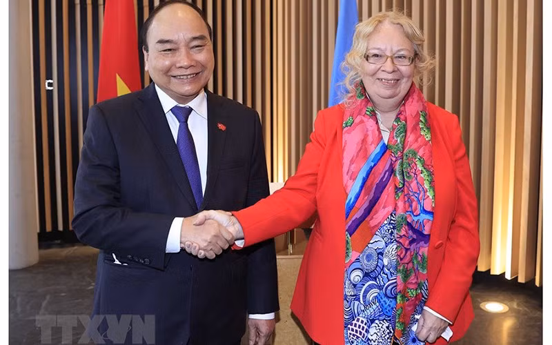 Chủ tịch nước Nguyễn Xuân Phúc gặp Tổng Giám đốc Văn phòng Liên hợp quốc tại Geneva ảnh 1