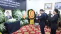 Đoàn đại biểu tỉnh Lào Cai viếng Chủ tịch Quốc hội Lào Xaysomphone Phomvihane tại Đại sứ quán Lào