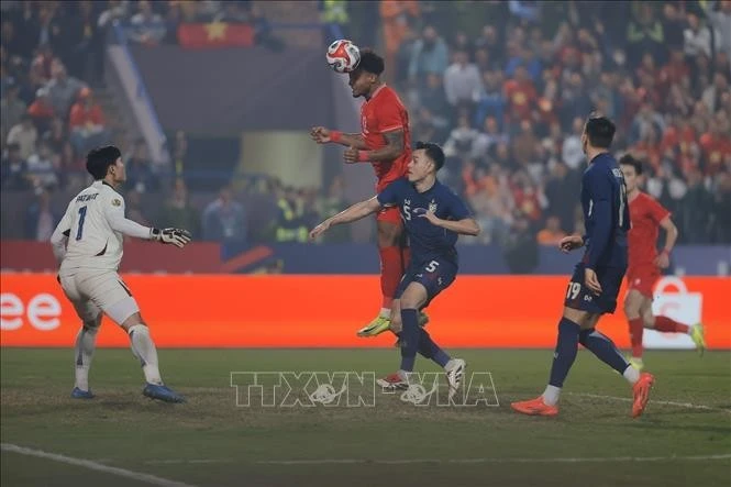Pha đánh đầu cận thành ghi bàn mở tỷ số cho Việt Nam ở phút 59. Ảnh: Minh Quyết/TTXVN
