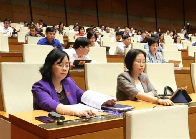 Quốc hội thông qua Nghị quyết của Quốc hội về thí điểm về một số cơ chế, chính sách đặc thù phát triển nhà ở xã hội. Ảnh: Văn Điệp/TTXVN