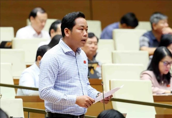 Đại biểu Quốc hội tỉnh Bà Rịa - Vũng Tàu Dương Tấn Quân phát biểu. Ảnh: Phạm Kiên/TTXVN