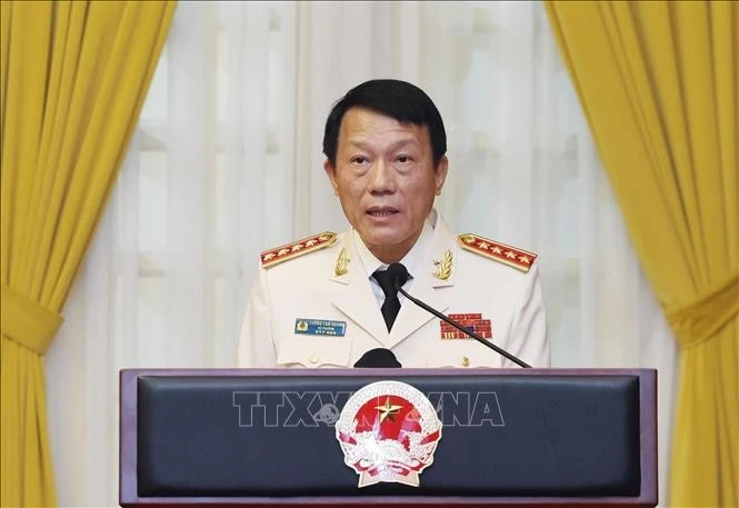 Thay mặt các đồng chí được thăng quân hàm, Đại tướng Lương Tam Quang, Ủy viên Bộ Chính trị, Bí thư Đảng ủy Công an Trung ương, Bộ trưởng Bộ Công an phát biểu. Ảnh: Lâm Khánh/TTXVN