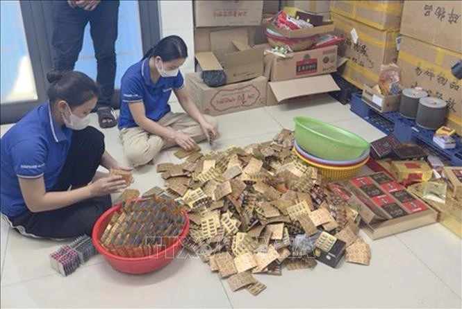 Đường dây sản xuất buôn bán hàng giả là thuốc chữa bệnh, thuốc phòng bệnh do hai vợ chồng Ngô Kim Diệu, Nguyễn Thị Ngọc Hương cầm đầu.