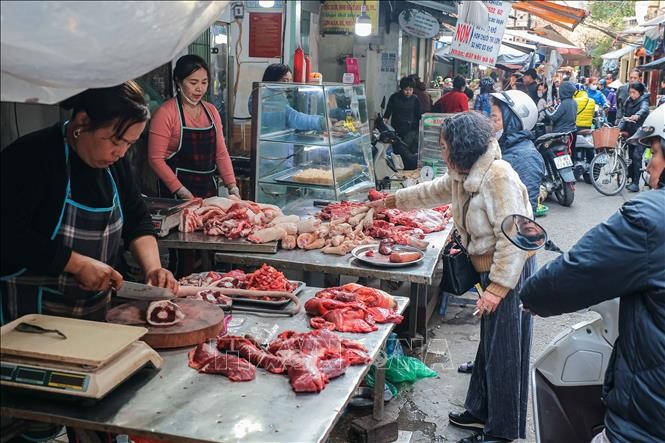 Tăng cường quản lý giá, ổn định thị trường sau Tết và năm 2025. Ảnh minh họa: Hoàng Hiếu/TTXVN Tăng cường quản lý giá, ổn định thị trường sau Tết và năm 2025. Ảnh minh họa: Hoàng Hiếu/TTXVN