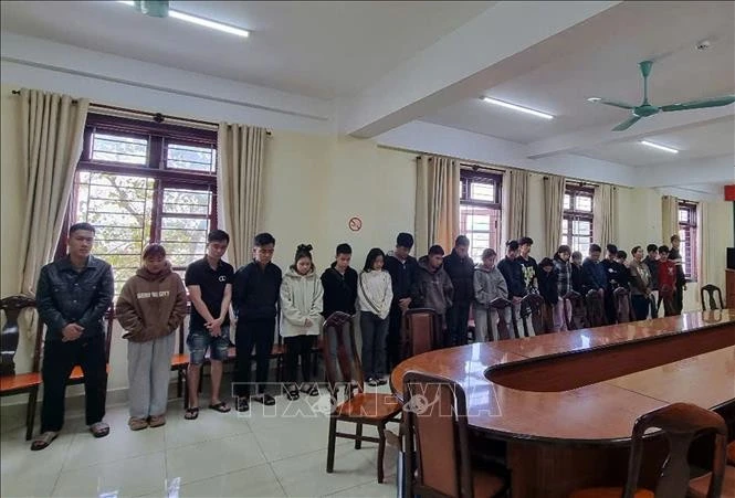 Các đối tượng bị bắt quả tang khi đang thực hiện giao dịch rửa tiền tại đường Tự Tạo, phường 11, thành phố Đà Lạt.