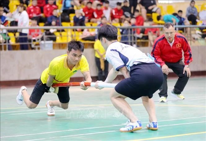 Các vận động viên nam tranh tài ở nội dung 60kg. Ảnh: Trung Kiên/TTXVN