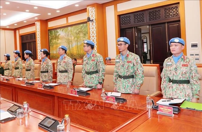 Các sĩ quan tại buổi lễ trao Quyết định. Ảnh: Trọng Đức/TTXVN