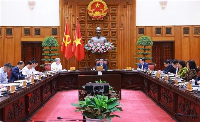 Thủ tướng Phạm Minh Chính chủ trì cuộc họp. Ảnh: Dương Giang/TTXVN
