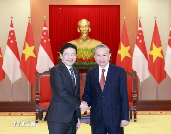 Tổng Bí thư Tô Lâm tiếp Thủ tướng Singapore, Tổng Thư ký Đảng Hành động Nhân dân Singapore (PAP) Lawrence Wong. (Ảnh: Thống Nhất/TTXVN)