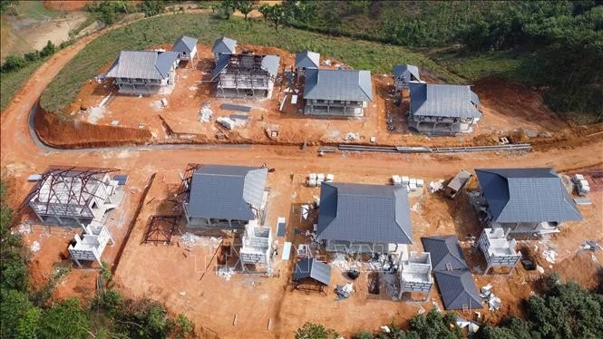 Những căn nhà đầu tiên tại Khu tái định cư làng Nủ, xã Phúc Khánh, huyện Bảo Yên, tỉnh Lào Cai. Ảnh: Hồng Ninh/TTXVN