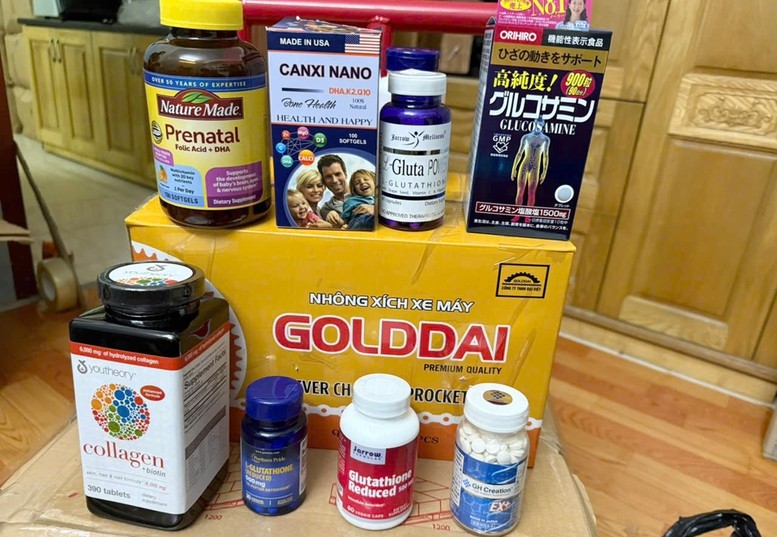 Các loại thuốc, thực phẩm chức năng do các đối tượng sản xuất thu giữ được - Ảnh: Bộ Công an