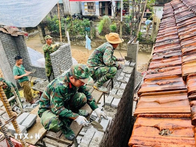 Chiến sỹ lữ đoàn 574 khẩn trương triển khai công tác xây nhà cho nhân dân ngay trong ngày đầu Năm Mới 2026.