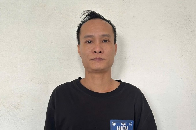 Nguyễn Đức Tiến khi về cơ quan công an đầu thú. Ảnh: Công an cung cấp