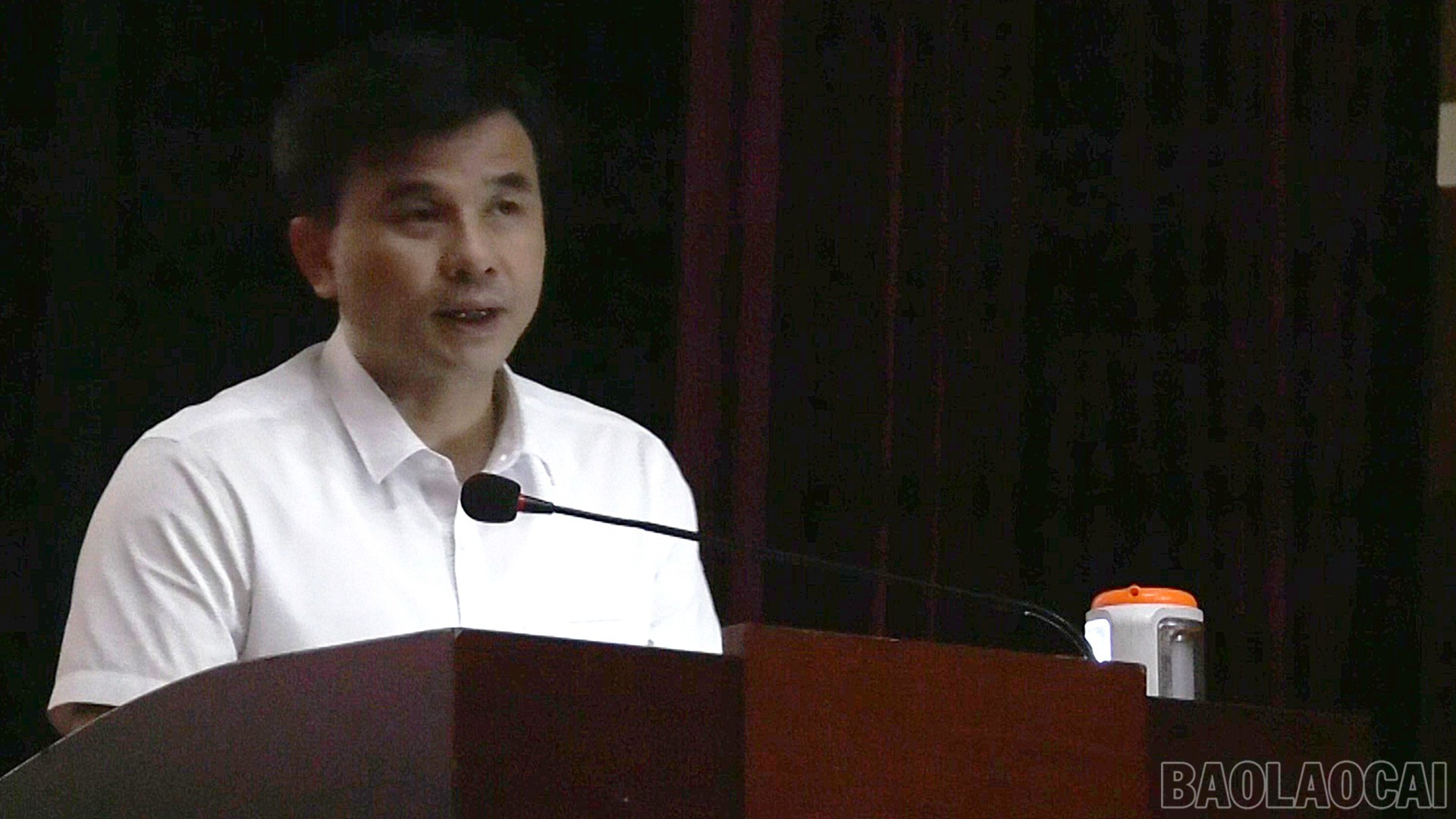 Đồng chí Đoàn Ngọc Tuyến - Bí thư Đảng uỷ, Chủ tịch HĐND xã phát biểu tại Hội nghị baolaocai-br_29-8-hopthanh1.jpg