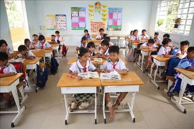 Học sinh tiểu học tại xã biên giới Phước Vinh, tỉnh Tây Ninh trong giờ học trên lớp. Ảnh minh họa.