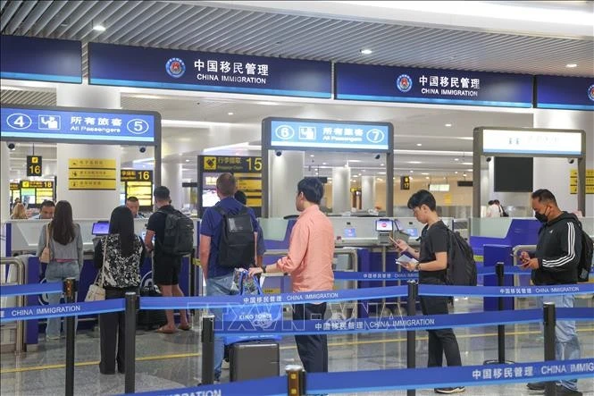 Hành khách tại sân bay quốc tế Giang Bắc Trùng Khánh, Trung Quốc, ngày 8/7/2025.