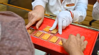 Ngân hàng đầu tiên ra mắt thương hiệu vàng miếng