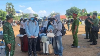 Tiếp nhận 353 công dân Việt Nam do phía Campuchia trao trả