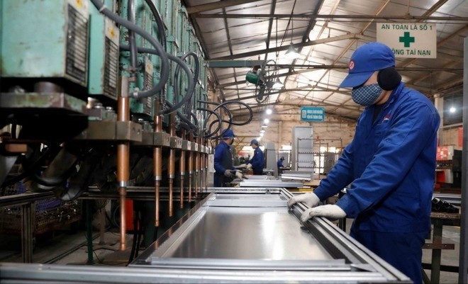 Hoạt động tại xưởng đột dập của Công ty Cổ phần Xuân Hòa, thành phố Phúc Yên (tỉnh Vĩnh Phúc). xuon-5069.jpg