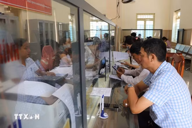 Người dân hài lòng với cung cách phục vụ mới tại các Trung tâm phục vụ hành chính công.