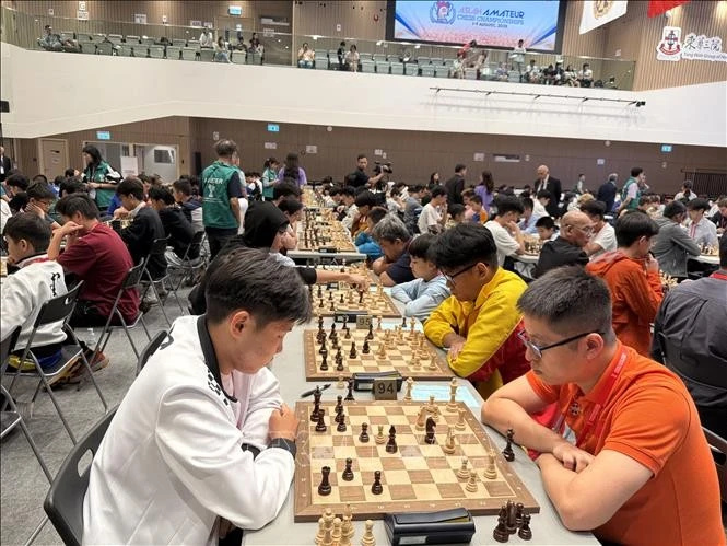 Các kỳ thủ thi đấu tại Giải vô địch cờ vua nghiệp dư châu Á ở Hong Kong.