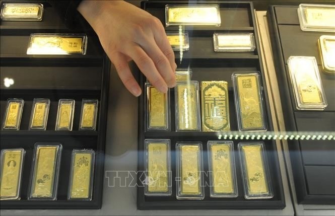 Vàng miếng được bày bán tại một cửa hàng ở tỉnh An Huy, Trung Quốc. gia-vang-3105.jpg