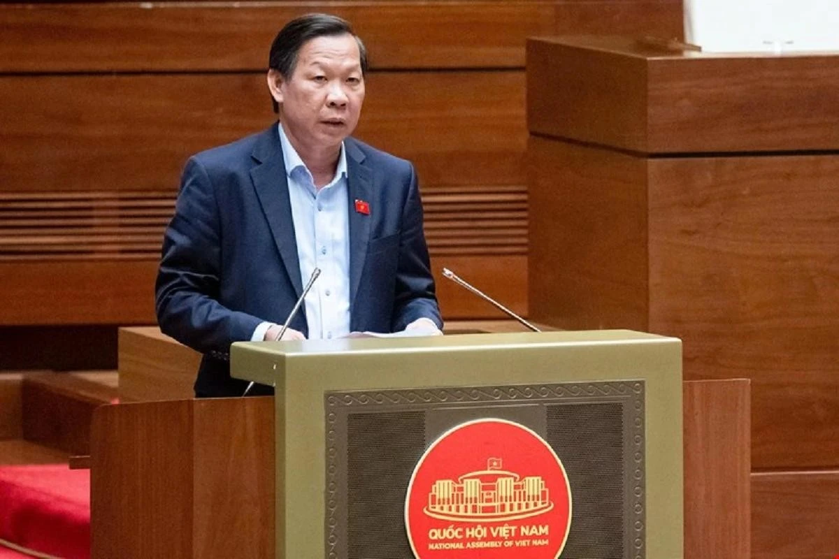Chủ nhiệm Ủy ban Kinh tế của Quốc hội Phan Văn Mãi trình bày báo cáo thẩm tra