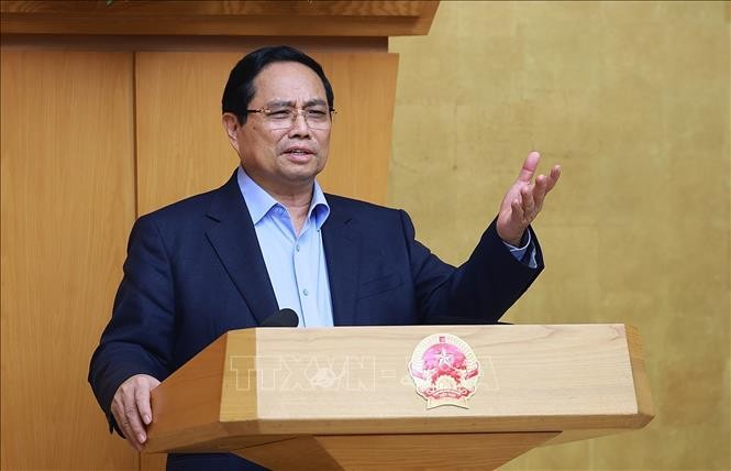 Thủ tướng Phạm Minh Chính chủ trì họp đánh giá tình hình Tết Nguyên đán Bính Ngọ. Ảnh: Dương Giang/TTXVN
