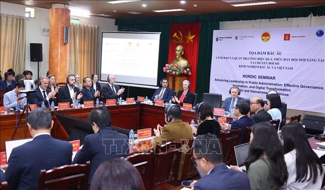 Toạ đàm khoa học “Lãnh đạo và Quản trị công hiệu quả, thúc đẩy đối mới sáng tạo và chuyển đổi số: Kinh nghiệm Bắc Âu và Việt Nam”. Ảnh: Văn Điệp/TTXVN