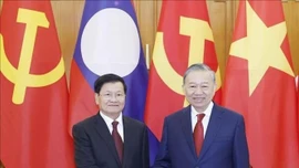 Điện mừng kỷ niệm 71 năm Ngày thành lập Đảng Nhân dân Cách mạng Lào