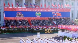 Lễ kỷ niệm, diễu binh, diễu hành chào mừng 50 năm Quốc khánh Lào