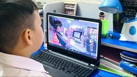 Bảo vệ, thúc đẩy trẻ em phát triển lành mạnh, tích cực trên môi trường mạng