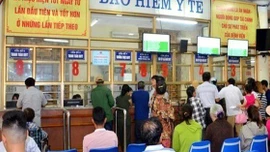 Thủ tục thanh toán trực tiếp chi phí khám chữa bệnh giữa BHXH và người tham gia BHYT thế nào?