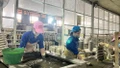 Workers of Hoang Lien S&#111;n Technical Ceramics jo&#105;nt Stock Company during their shift.