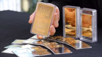 Giá vàng thế giới chạm mức thấp nhất gần ba tuần