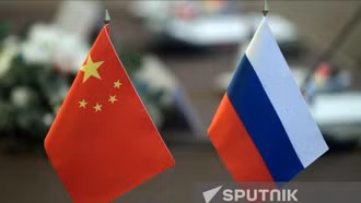 Nga và Trung Quốc tăng cường hợp tác giữa các đảng cầm quyền