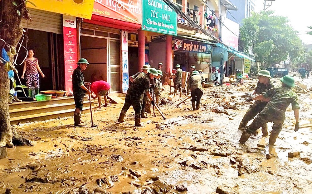 Tiên phong trên “mặt trận không tiếng súng” ảnh 1 Tiên phong trên “mặt trận không tiếng súng” ảnh 1