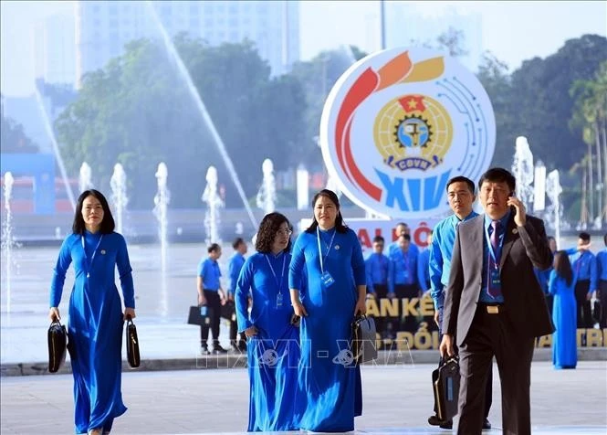 Các đại biểu đến dự Phiên làm việc trọng thể Đại hội XIV Công đoàn Việt Nam.