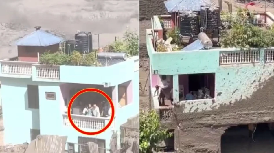 Nữ chủ nhân ngôi nhà xanh tại Nepal, đến nay vẫn chưa dám tin rằng cả gia đình có thể sống sót. (Ảnh: The Telegraph)