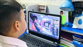 Bảo vệ, thúc đẩy trẻ em phát triển lành mạnh, tích cực trên môi trường mạng