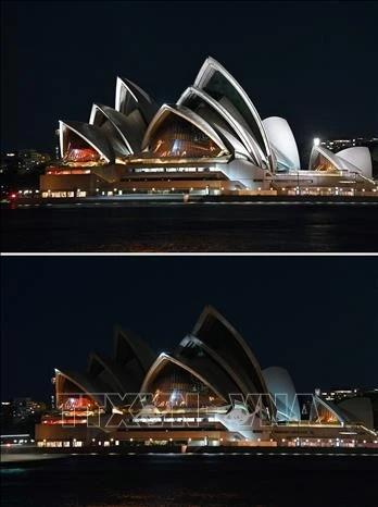 Nhà hát opera Sydney ở Australia trước (ảnh trên) và sau (ảnh dưới) thời điểm tắt đèn hưởng ứng Giờ Trái Đất, ngày 27/3/2021.