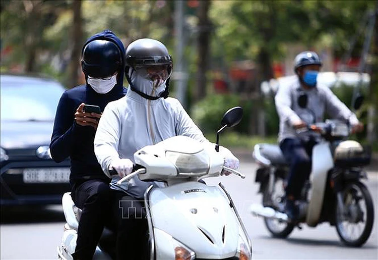 Thời tiết ngày 18/6: Bắc Bộ, Trung Bộ nắng nóng gay gắt ảnh 1 Chú thích ảnh