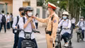 Học sinh đi xe đạp điện không đội mũ bị phạt tới 600.000 đồng