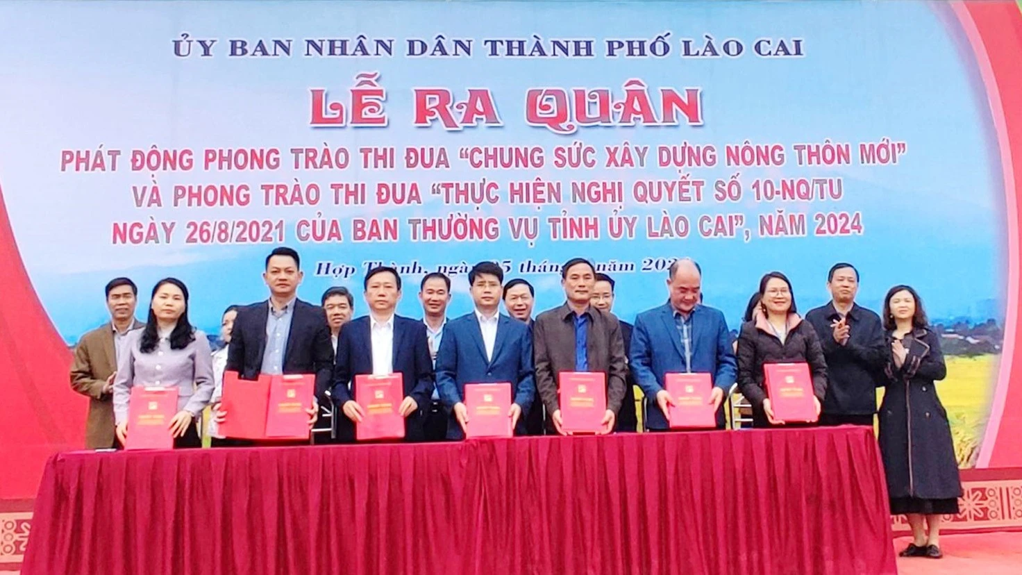 lanh-dao-ubnd-7-xa-tren-dia-ban-thanh-pho-da-ky-cam-ket-huong-ung-phong-trao-thi-dua-chung-suc-xay-dung-nong-thon-moi-tren-dia-ban-thanh-pho-lao-cai-va-phong-trao-thi-dua-thuc-hien-nghi-quyet-so-10-ngay-26-3164.jpg