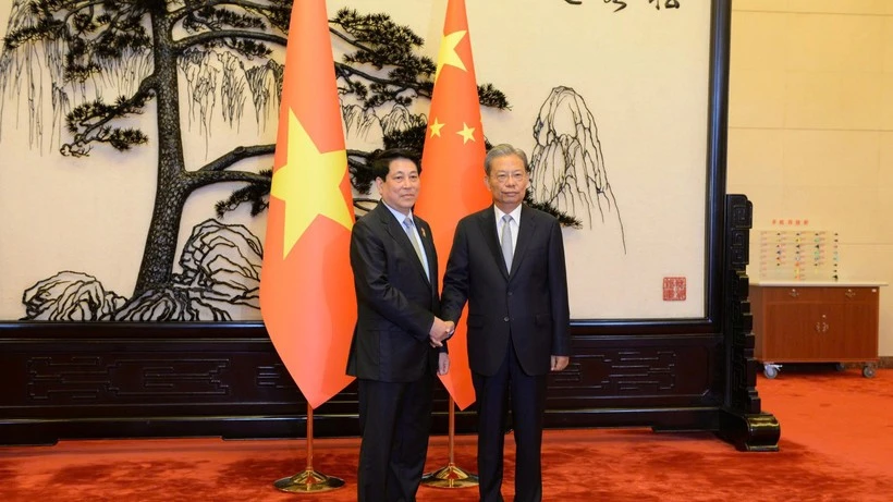 Chủ tịch nước Lương Cường hội kiến với Ủy viên trưởng Nhân đại toàn quốc Trung Quốc Triệu Lạc Tế.