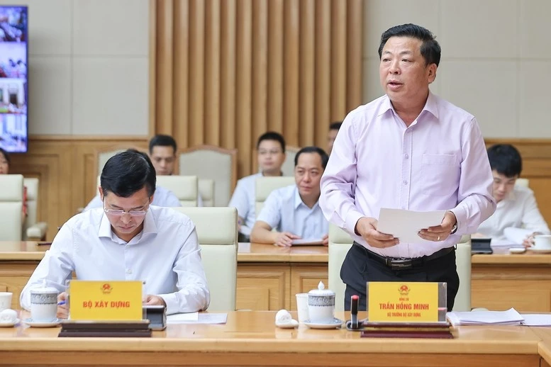 Bộ trưởng Bộ Xây dựng Trần Hồng Minh phát biểu tại hội nghị.