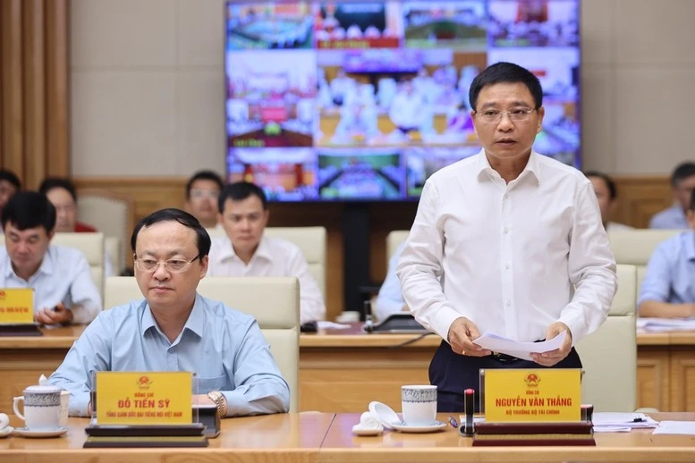 Bộ trưởng Bộ Tài chính Nguyễn Văn Thắng phát biểu tại hội nghị.