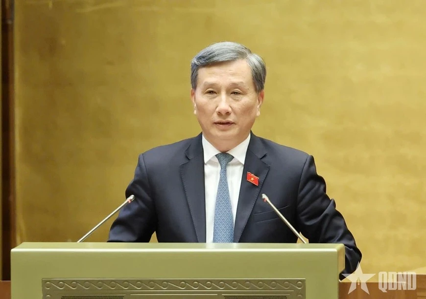 Chủ nhiệm Ủy ban Khoa học, Công nghệ và Môi trường của Quốc hội Lê Quang Huy trình bày báo cáo trước Quốc hội.