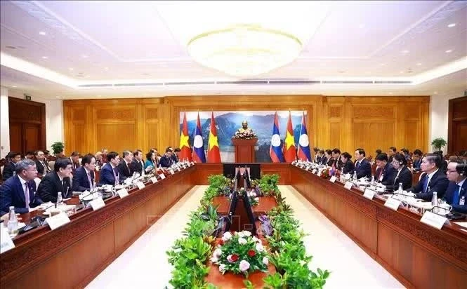 Thủ tướng Lê Minh Hưng hội kiến Chủ tịch Quốc hội Lào Sonexay Siphandone. Ảnh: Dương Giang – TTXVN