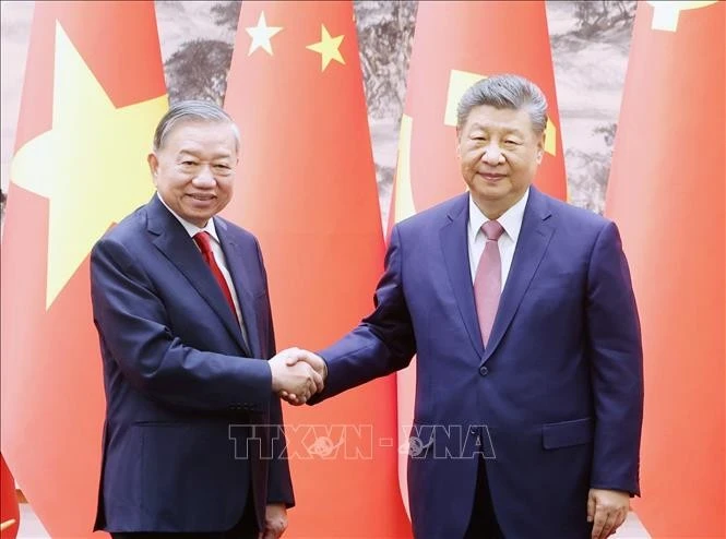 Tổng Bí thư, Chủ tịch nước Tô Lâm và Tổng Bí thư, Chủ tịch nước Tập Cận Bình tại cuộc chứng kiến Lễ ký các văn kiện hợp tác giữa hai nước.